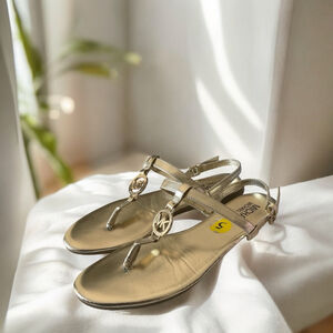 $10$ add on Michael Kors Gold Mandi thong sling back logo medallion sandals Sz 5